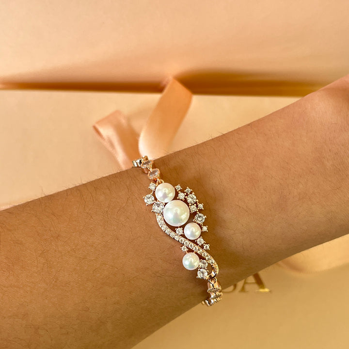 Zircone and white pearls rose gold plated bracelet