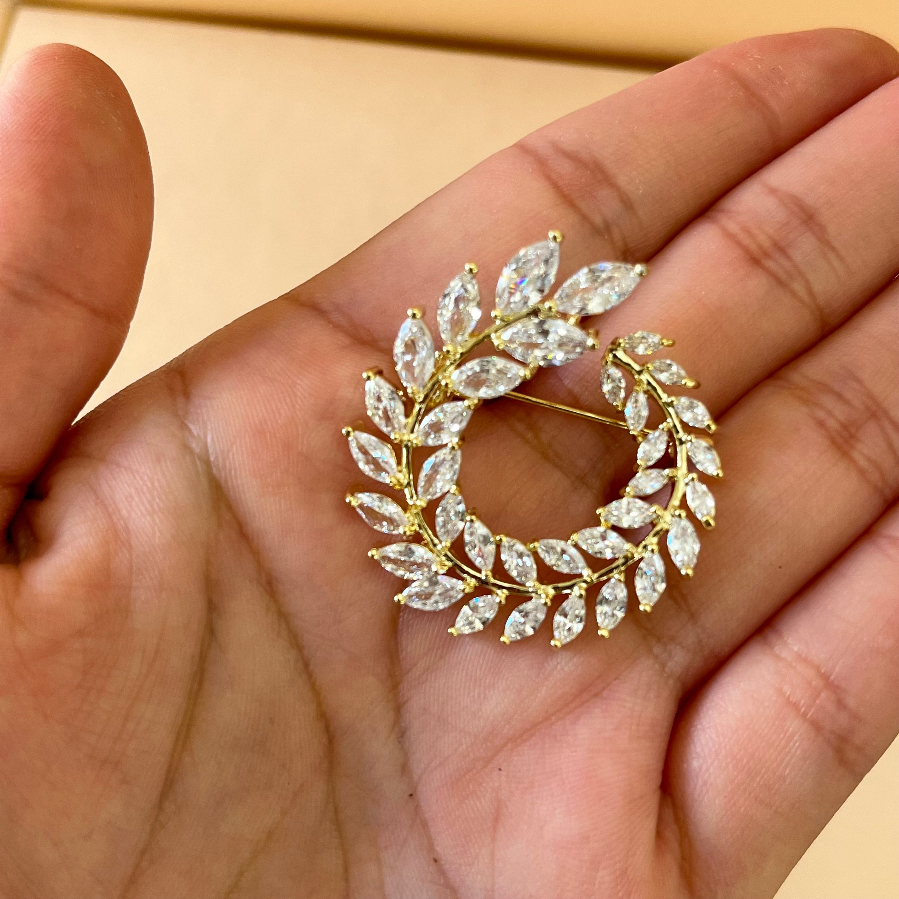 Marquise round brooch