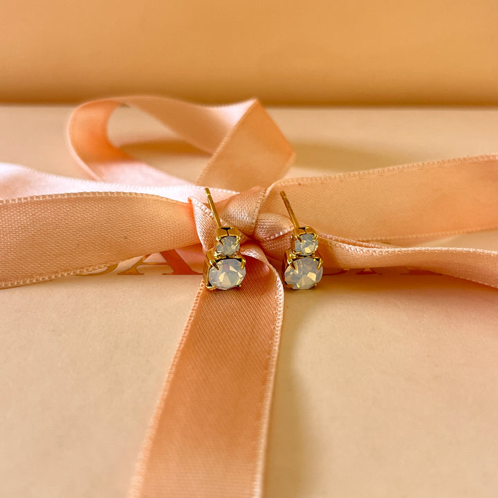 White Swarovski crystals studs