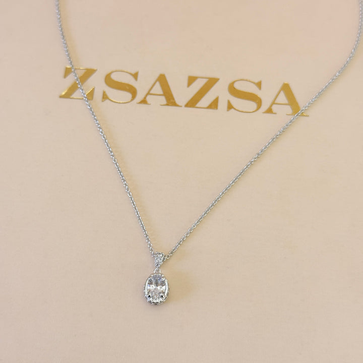 Dainty oval zircone silver pendant