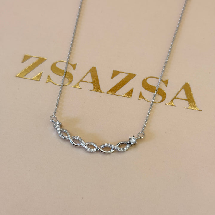 Dainty zircone silver pendant