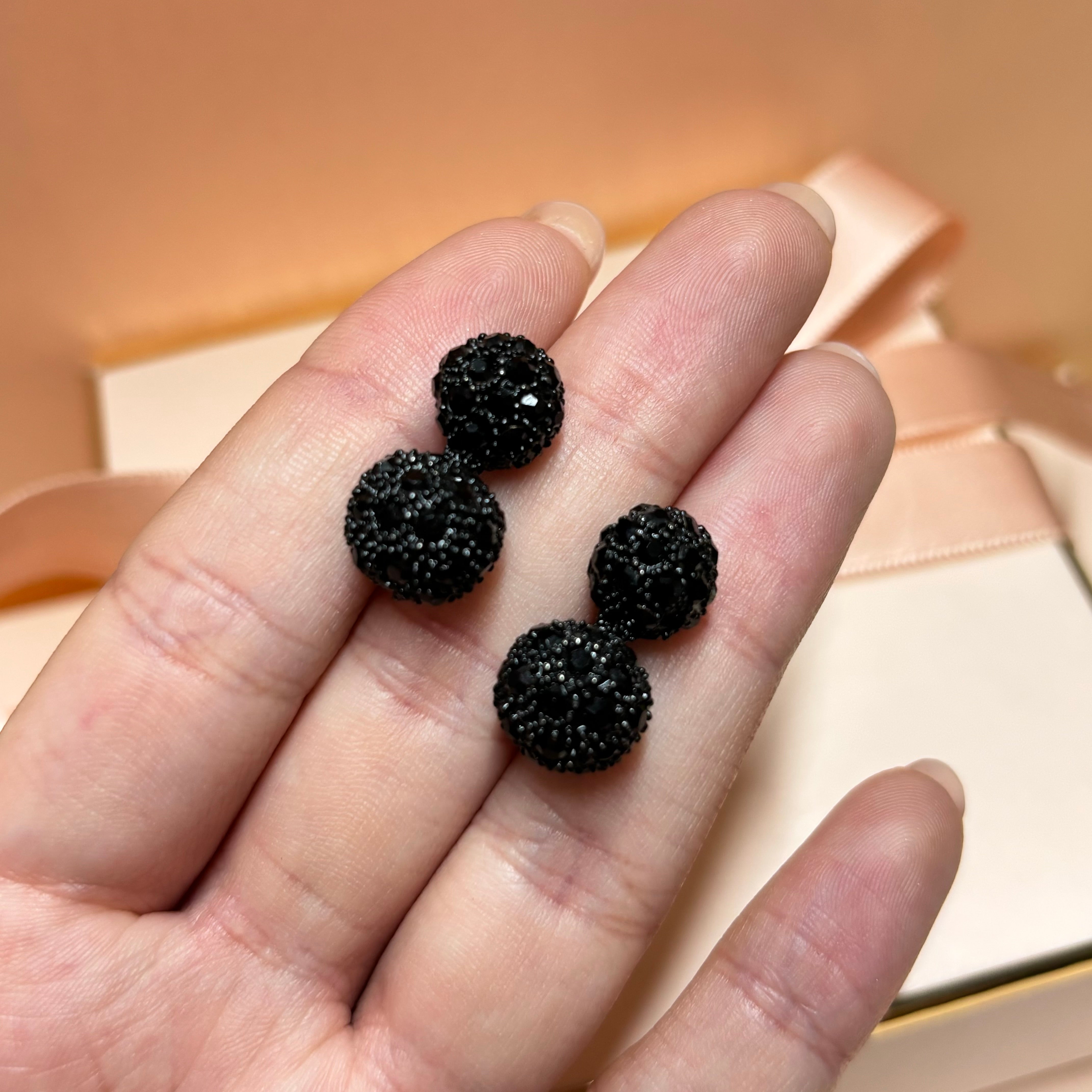 Double ball black earrings