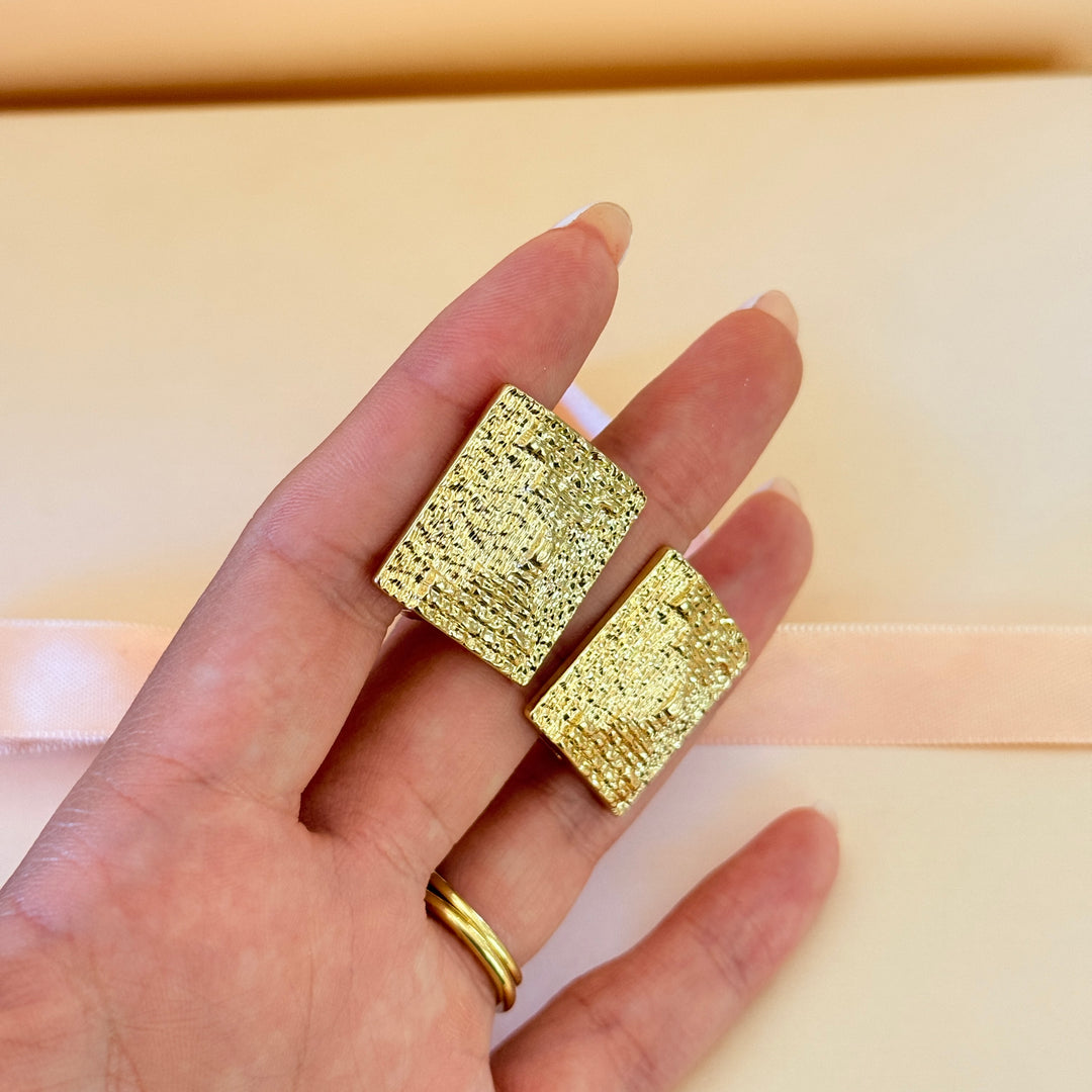 Plain chunky texture squeaker gold plated clip on earrings