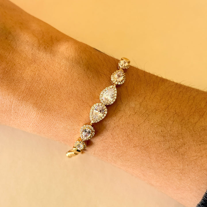 Teardrop zircone gold plated earrings and bracelet