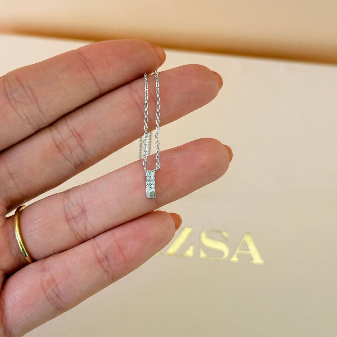 Dainty zircons silver pendant