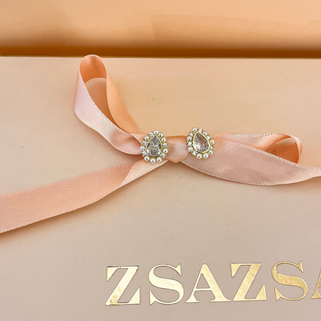 Teardrop zircone and white pearls gold plated earrings