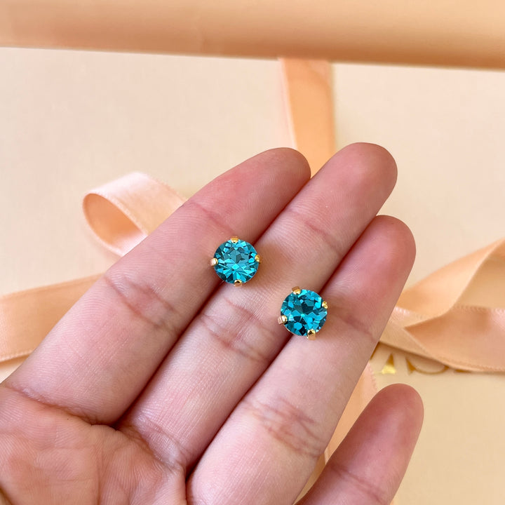 Solitaire turquoise Swarovski crystals studs