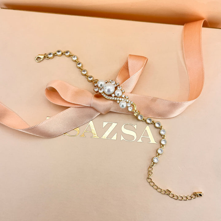 Zircone and white pearls gold plated bracelet