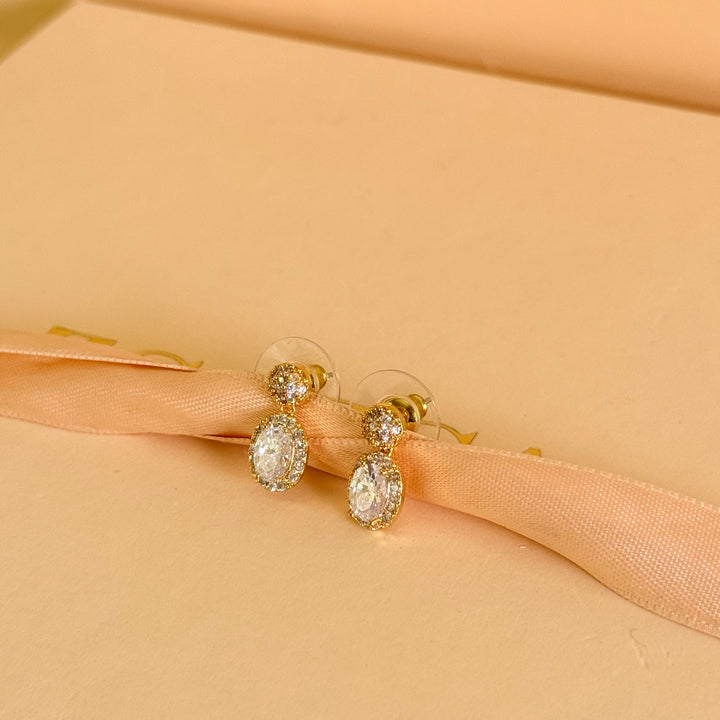 Round and oval dangle zircone gold plated earrings