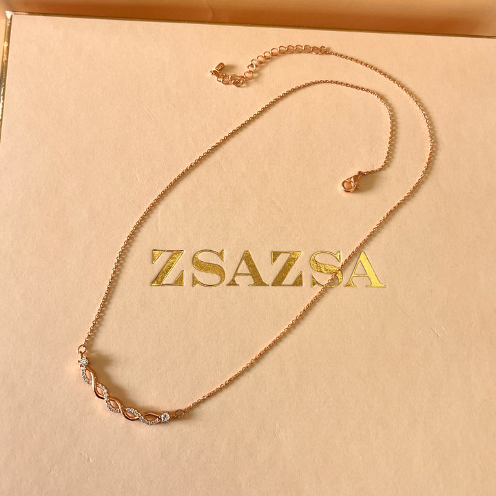 zircone rose gold plated twisted pendant
