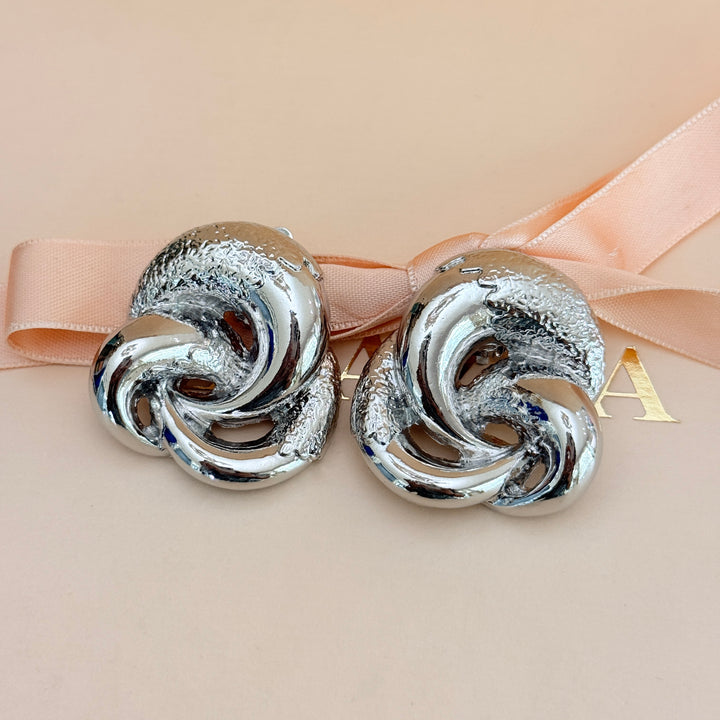 Plain chunky twisted silver clip on earrings
