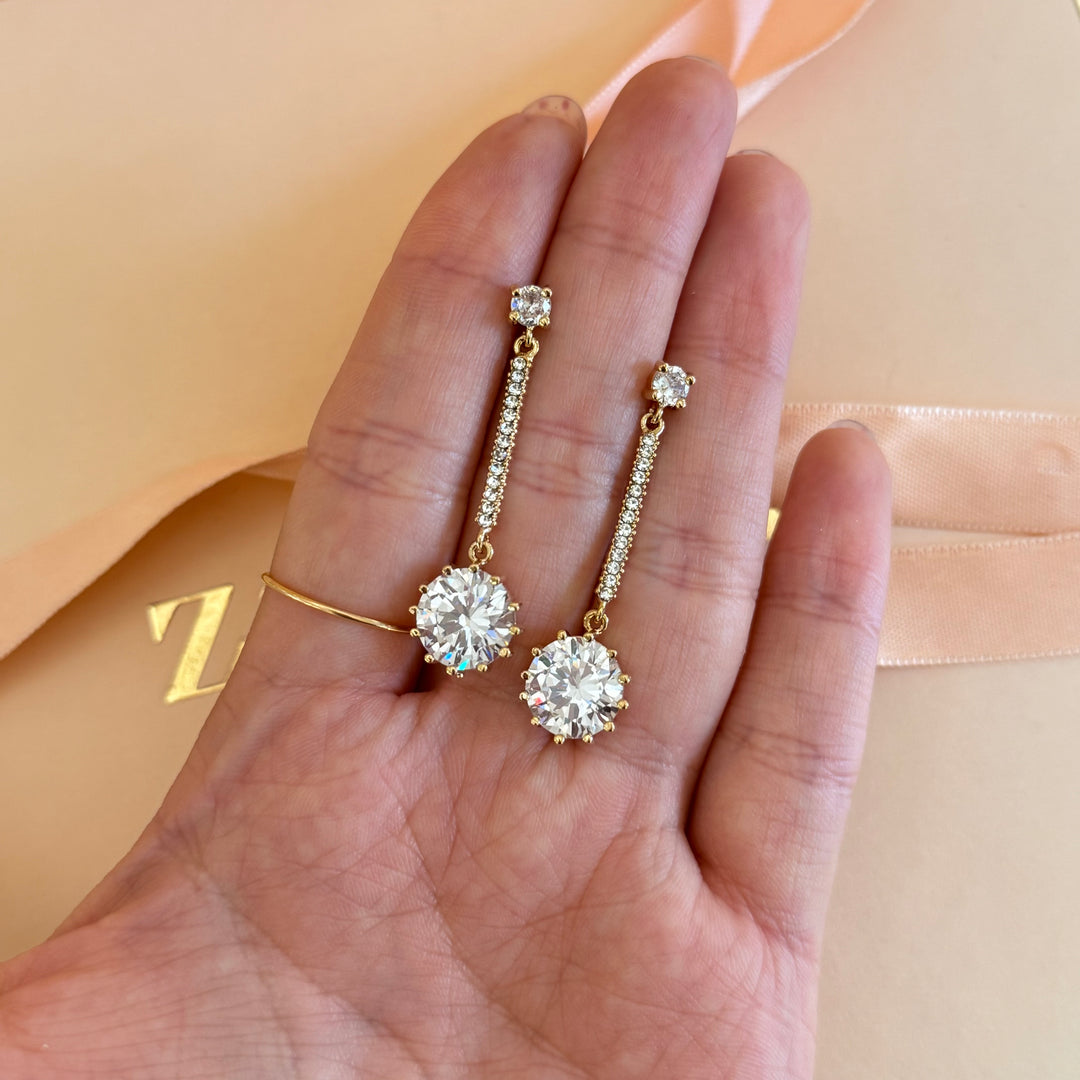 Line and round zircone gold plated earrings