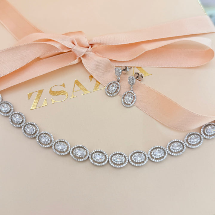 Oval zircone silver earrings and bracelet