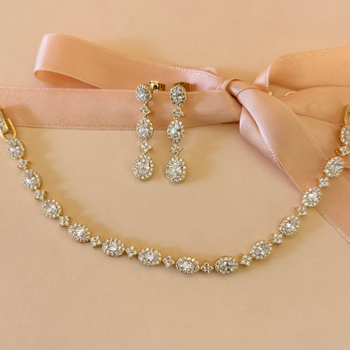 Oval zircone gold plated earrings and bracelet set