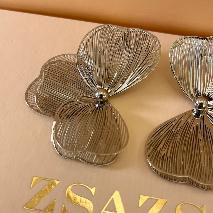 Half flower white gold plated earrings