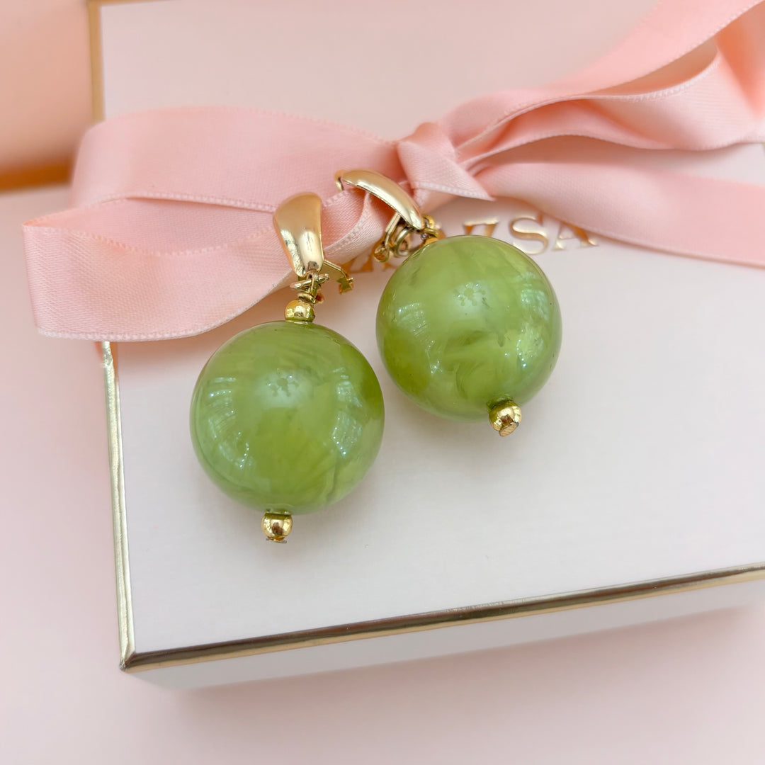 Green ball earrings