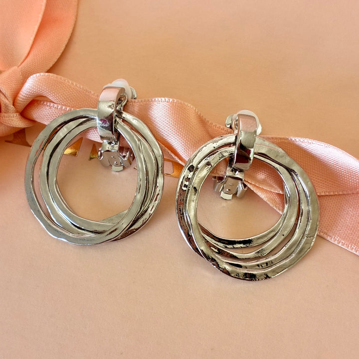 Dangle round clip on earrings