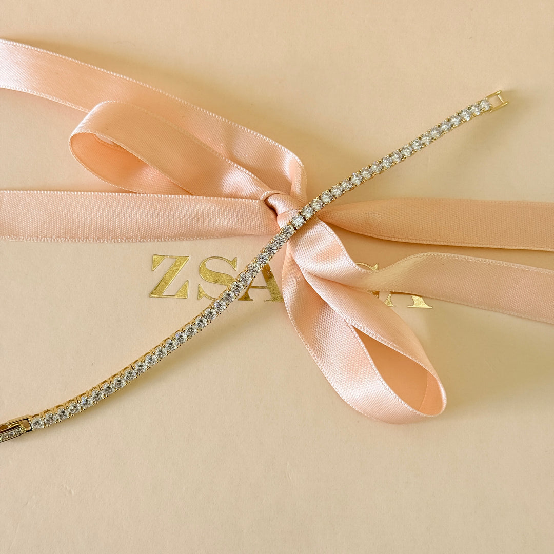 Tennis zircone gold plated earrings and bracelet