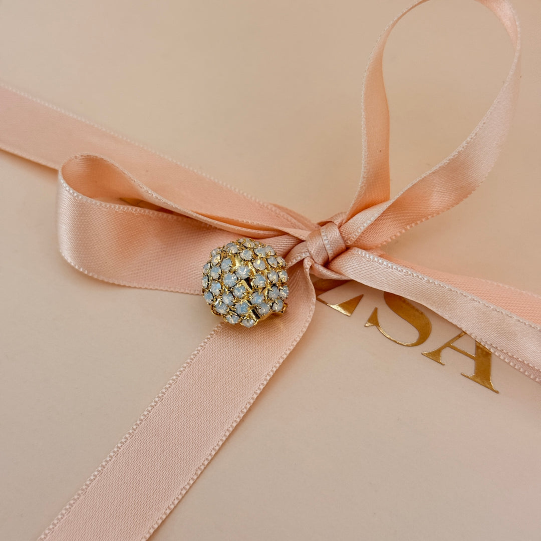 White preciosa crystals gold plated brooch