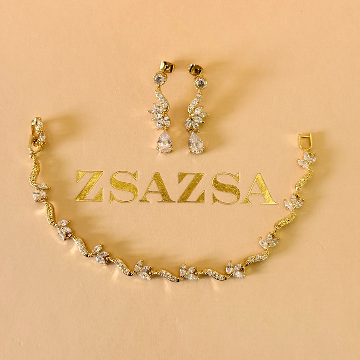 Teardrop and marquise zircone gold plated earrings and bracelet