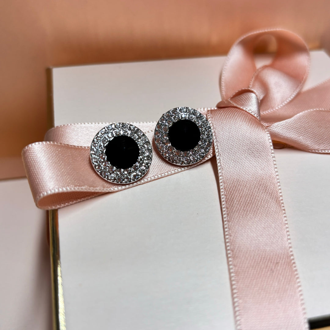 Elegant black silver studs