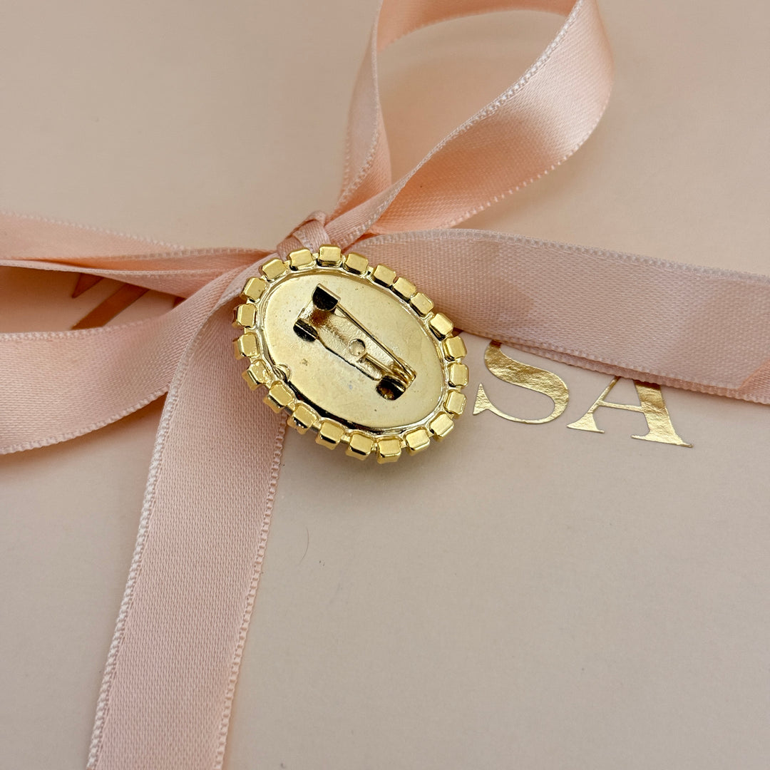 Oval preciosa crystals gold plated brooch
