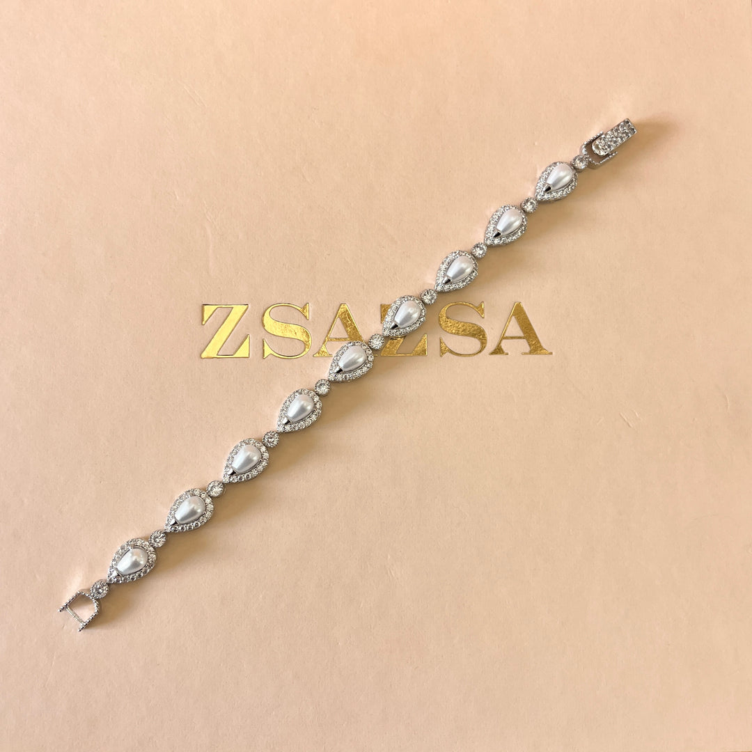 Zircone and white pearls white gold plated teardrop set