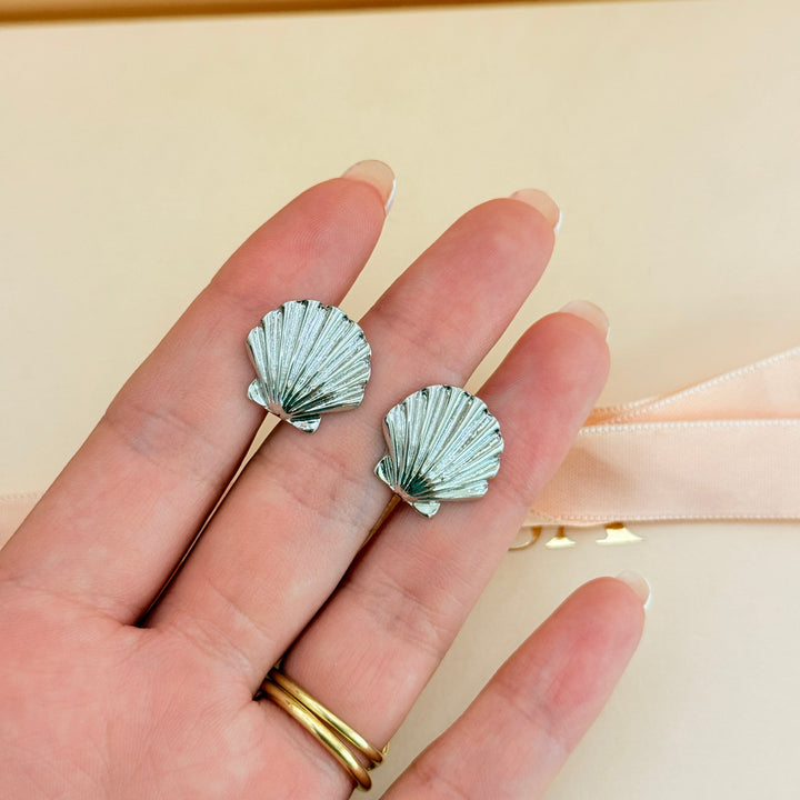 Plain shell silver clip on earrings