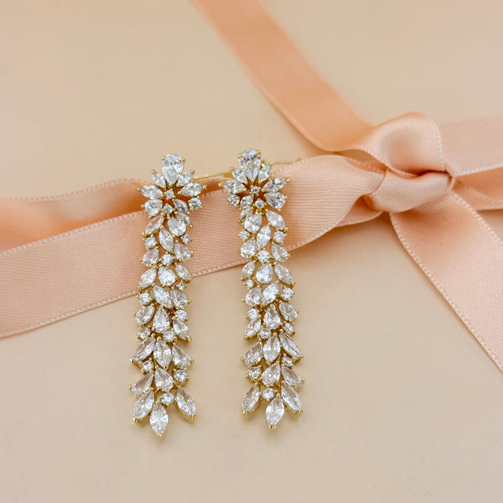Long marquise zircone gold plated earrings