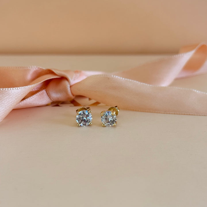 Small zircone solitaire gold plated earrings