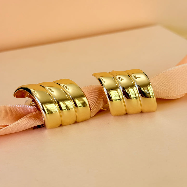 Plain statement gold plated clip on earrings