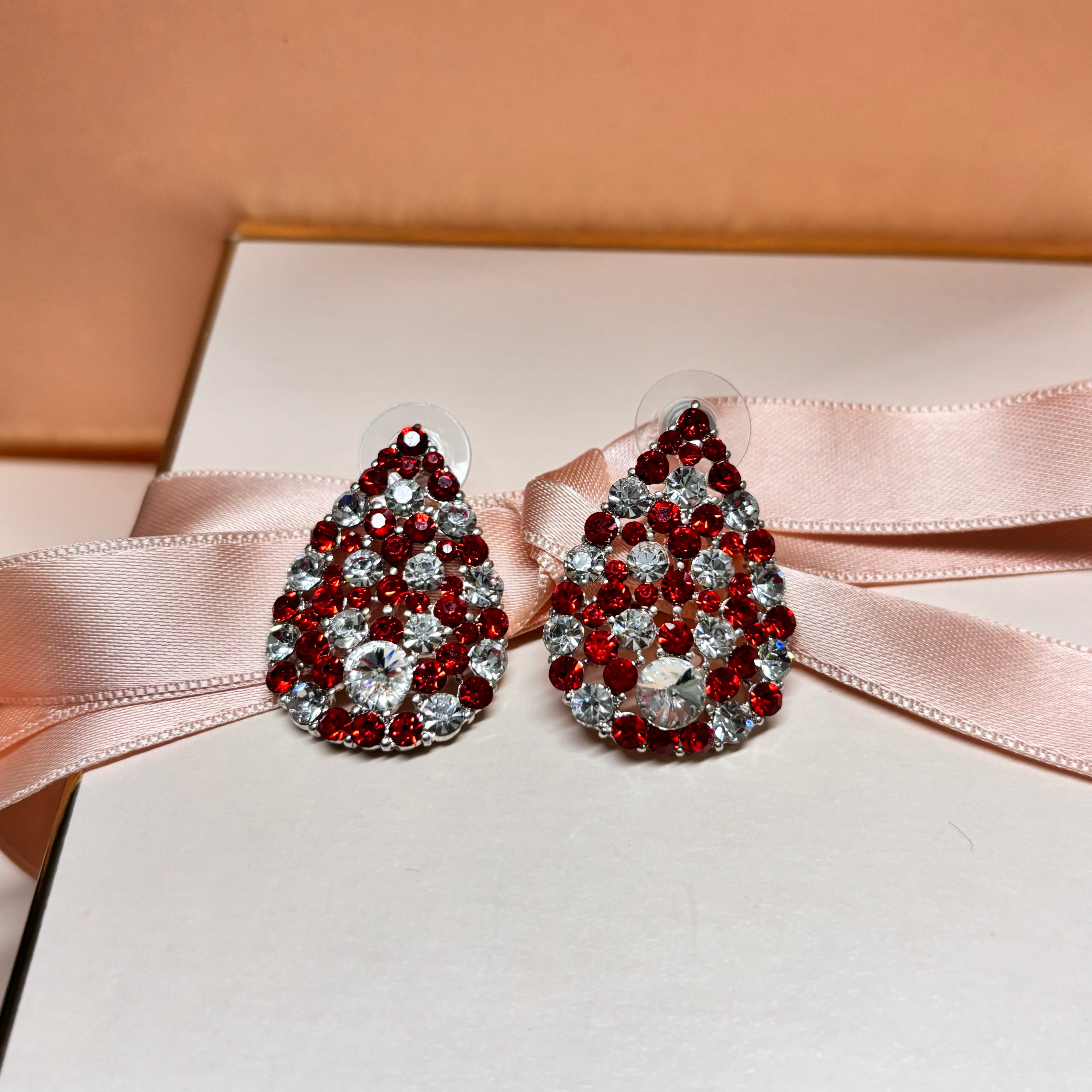 Red stud earrings