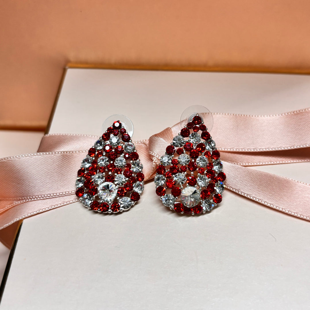 Red stud earrings