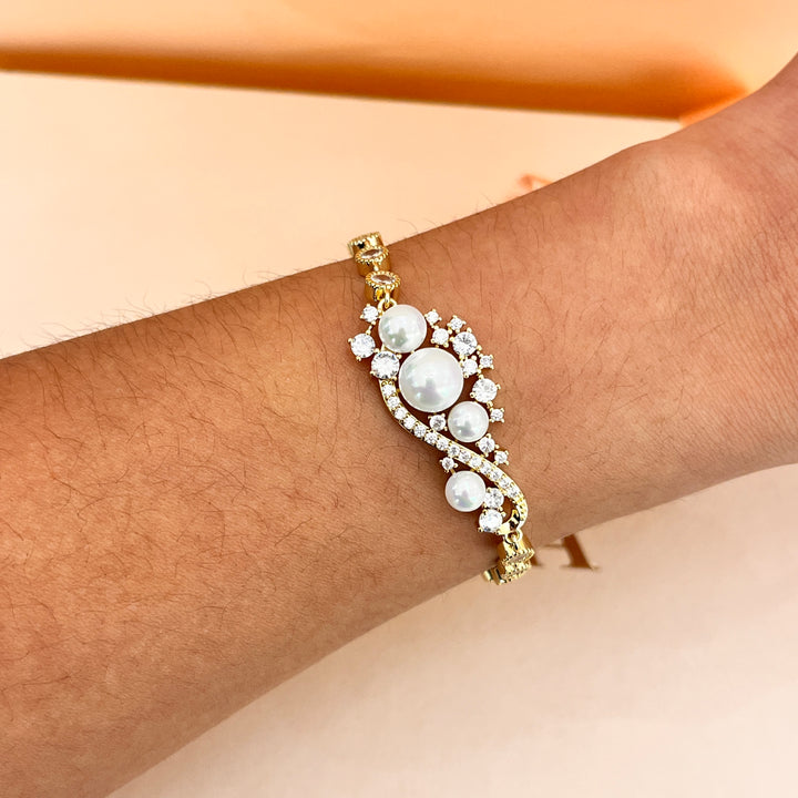 Zircone and white pearls gold plated bracelet