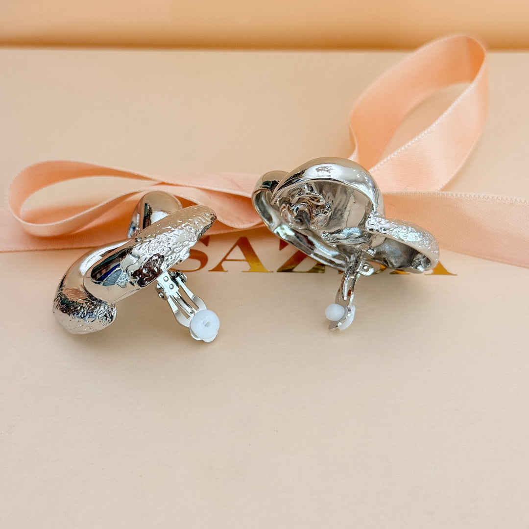 Plain chunky twisted silver clip on earrings