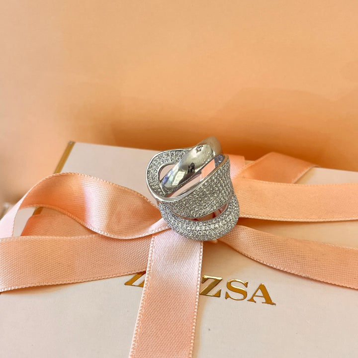 Zircone white gold plated crossed chunky ring