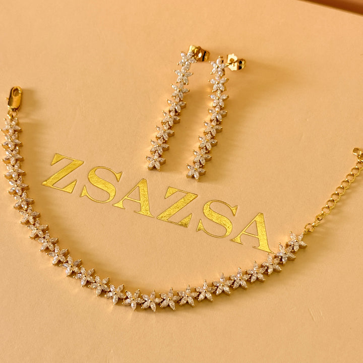 Dainty flowers zircone gold plated earrings and bracelet