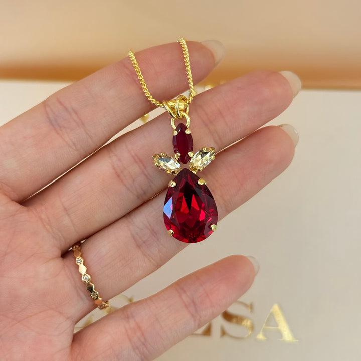 Marquise and teardrop dark red Swarovski crystals gold plated set