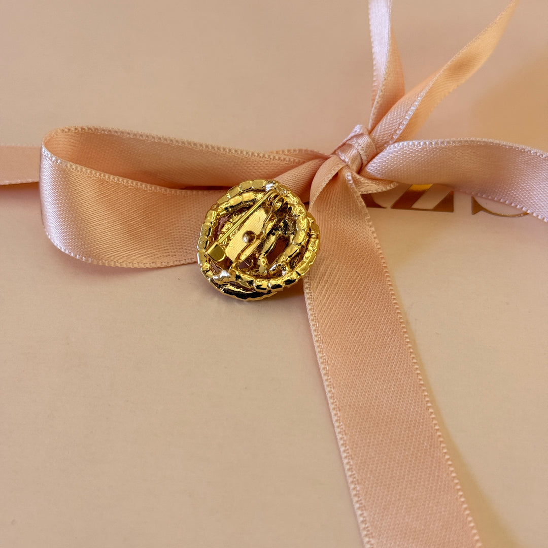 Round Orange preciosa crystals gold plated brooch