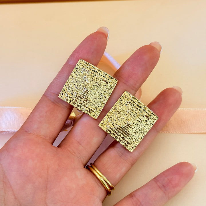 Plain chunky texture squeaker gold plated clip on earrings