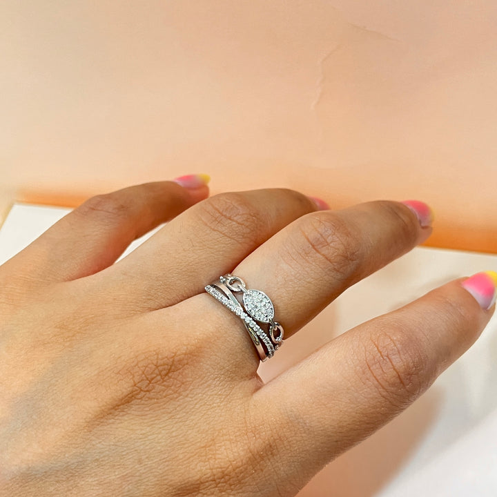 Zircone white gold plated twisted and crossed band ring