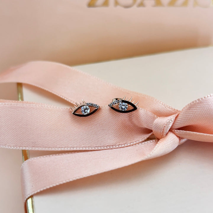 Eye stud earrings