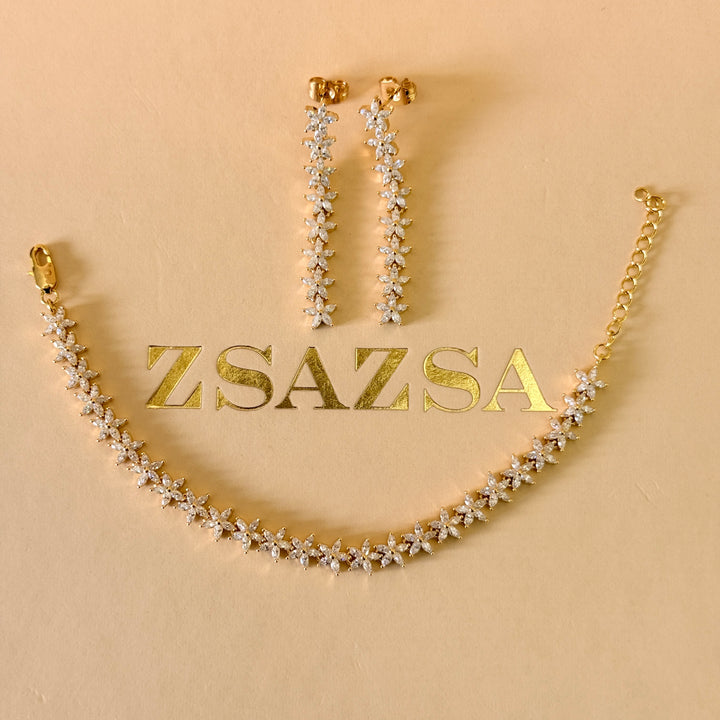 Dainty flowers zircone gold plated earrings and bracelet