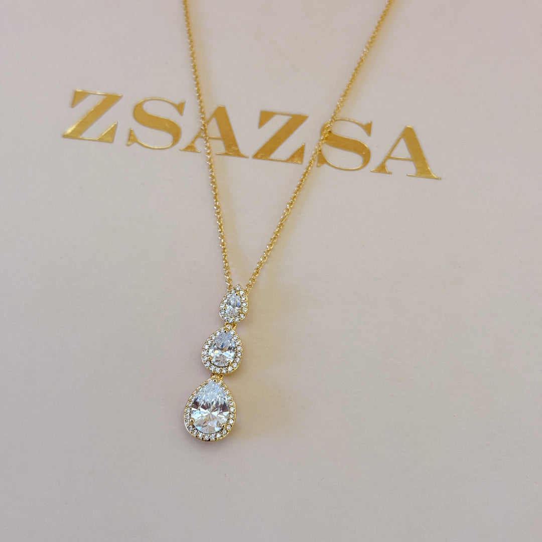 Triple teardrop zircone gold player pendant set