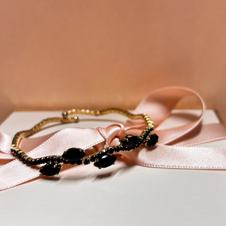 Dainty black gold bangle
