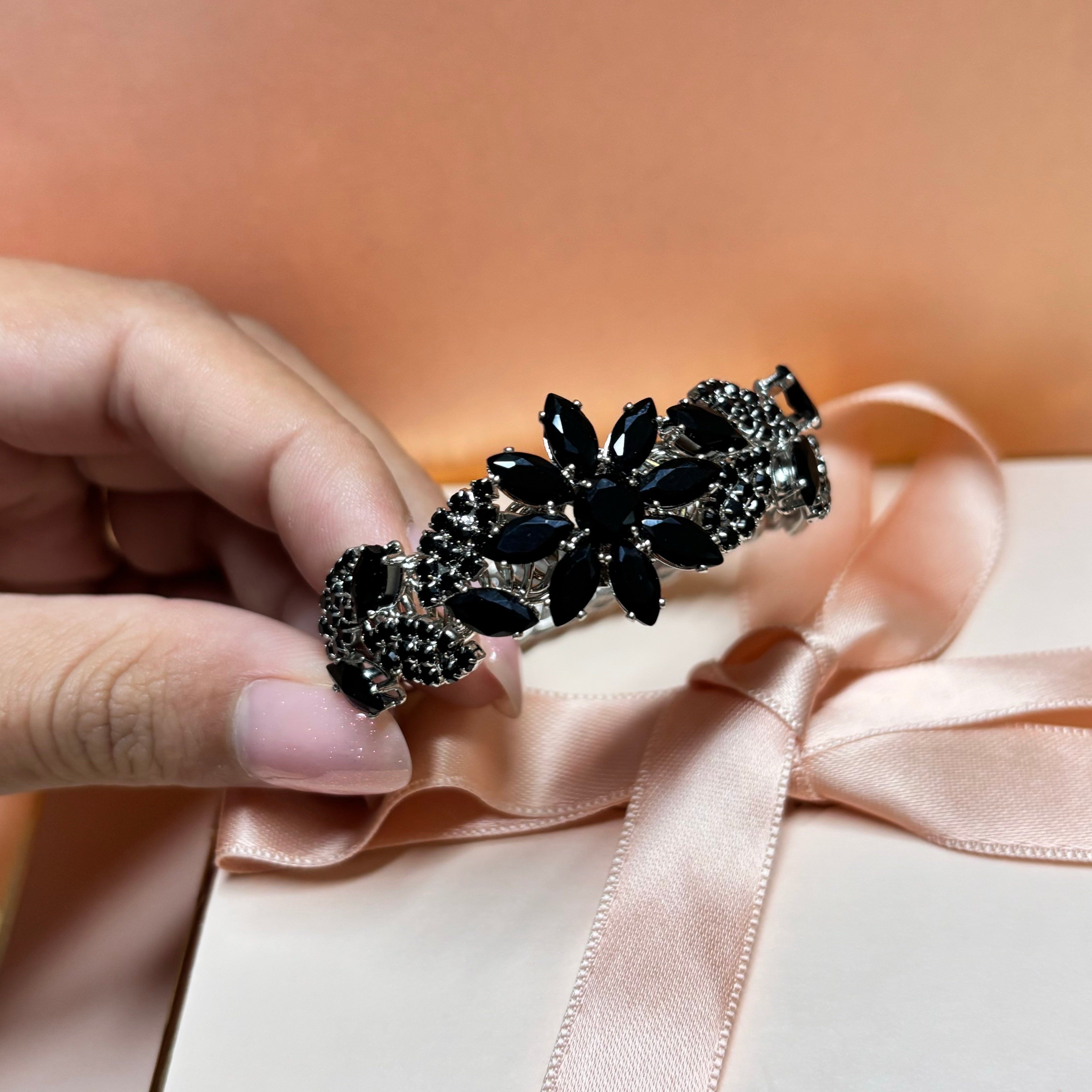 Elegant black flower bangle