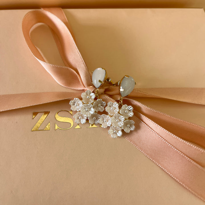 White flowers gold plated earrings