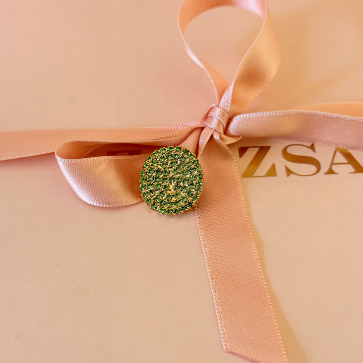 Round light green preciosa crystals gold plated brooch