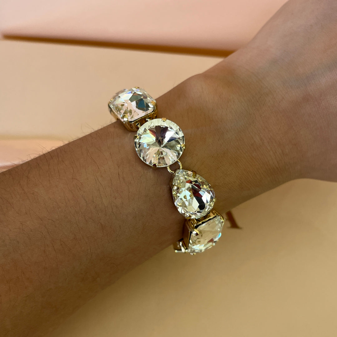 Swarovski crystals mix of shapes  gold plated earrings and bracelet