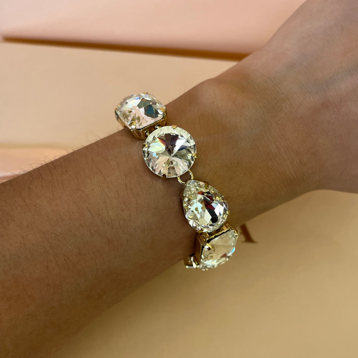Swarovski crystals mix of shapes  gold plated earrings and bracelet